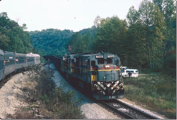 C30-7s 7056-7066 push against the former SCL caboose.